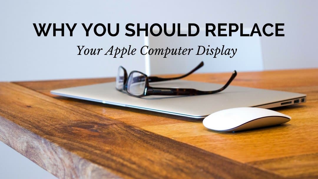A photo of an apple laptop and a mouse placed on top of a table with prescription glasses on top of the computer. The words "Why You Should Replace Your Apple Computer Display" are displayed at the top of the screen center justified.